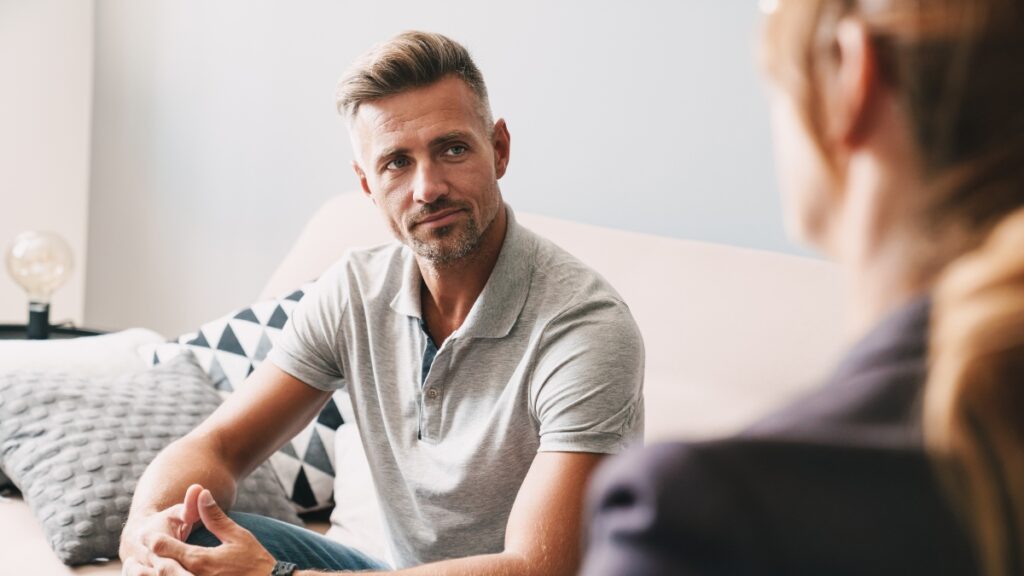 A man discusses health coping mechanisms during a consultation for a cocaine addiction treatment program in ohio