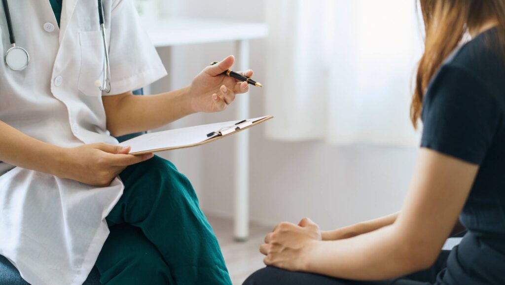 A doctor provides support to client during Xanax addiction treatment in Ohio.