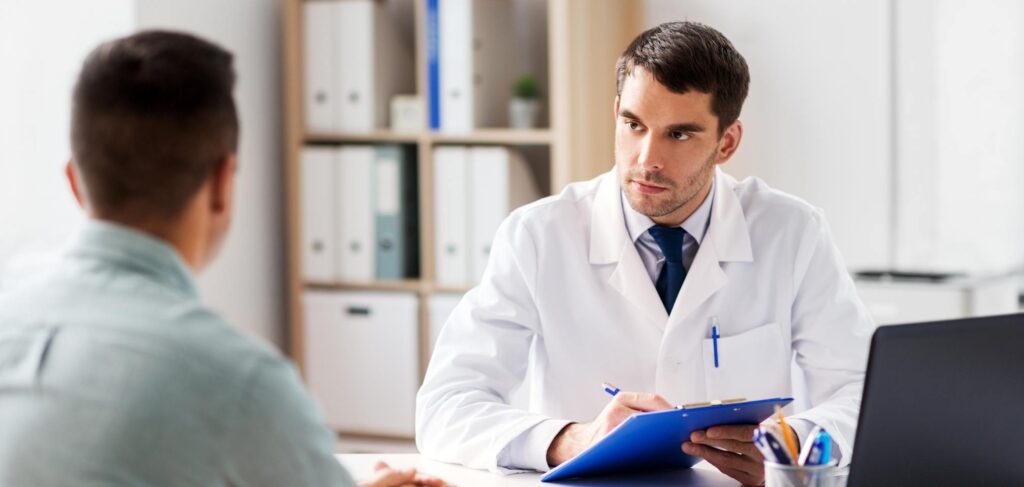 Doctor working with client in opioid addiction treatment in Ohio.