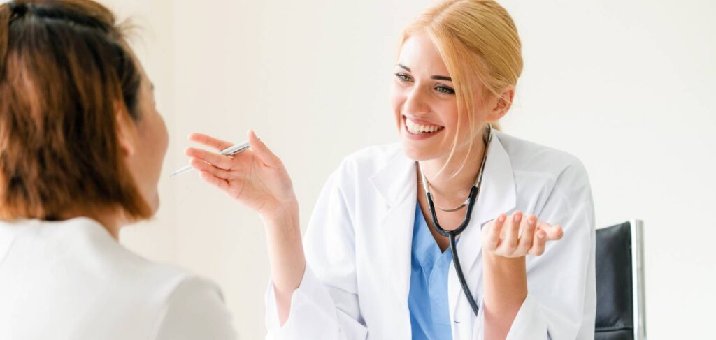 Doctor guiding client through medical detox as part of CBT in Ohio.