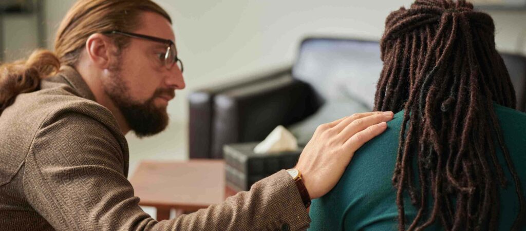 Therapist offering emotional support during Ohio depression treatment.