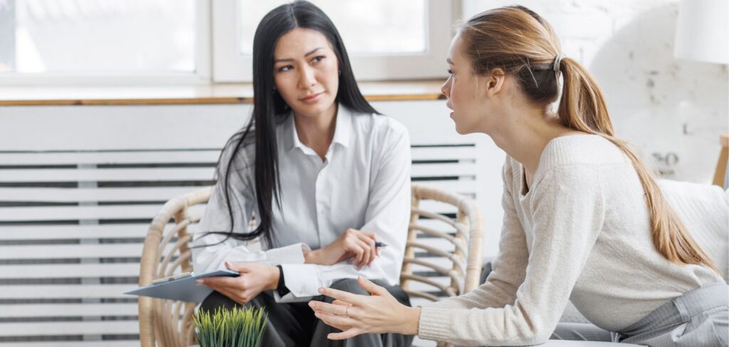 Patient talking with therapist during MDMA detox in Ohio.
