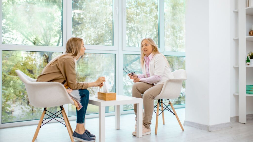 Woman talking to her counsellor during a Percocet Detox therapy